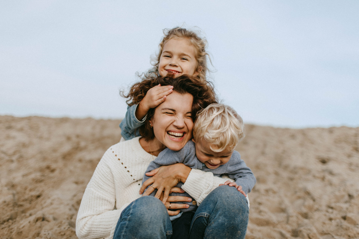 Happy mother and children